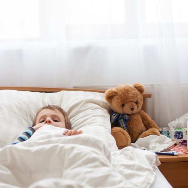 child in bed with a cold 